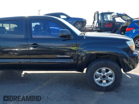 2008 Toyota Tacoma PreRunner with VIN 3TMJU62N88M055390, listed as a IAAI auction lot 41679933 with 247,340 mi miles. Bid and sale history available at carsss.com. Image 18.