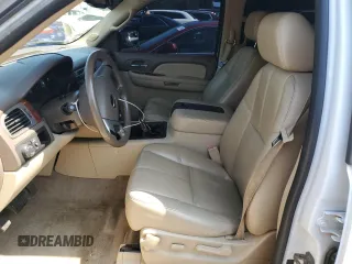 2009 GMC Yukon SLT w/4SA with VIN 1GKEC33309R214195, listed as a Copart auction lot 61430404 with 174,776 mi miles and Salvage Title. Bid and sale history available at carsss.com. Image 7.