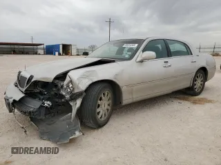 2010 Lincoln Town Car Signature Limited z VIN 2LNBL8CV9AX631074, wystawiony jako Copart lot #53834355 z przebiegiem 73 953 mil mil oraz Szkoda całkowita • Salvage title. Historia ofert i sprzedaży dostępna na DreamBid. Obrazek 1.