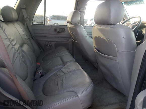 2000 GMC Jimmy SLE Convenience z VIN 1GKDT13W7Y2393191, wystawiony jako Copart lot #82301364 z przebiegiem 160 004 mil mil oraz Czysty tytuł • Clean title. Historia ofert i sprzedaży dostępna na DreamBid. Obrazek 11.