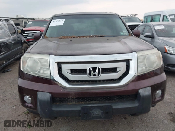 2010 Honda Pilot EX-L z VIN 5FNYF4H58AB023439, wystawiony jako IAAI lot #42384163 z przebiegiem 232 838 mil mil oraz . Historia ofert i sprzedaży dostępna na DreamBid. Obrazek 12.