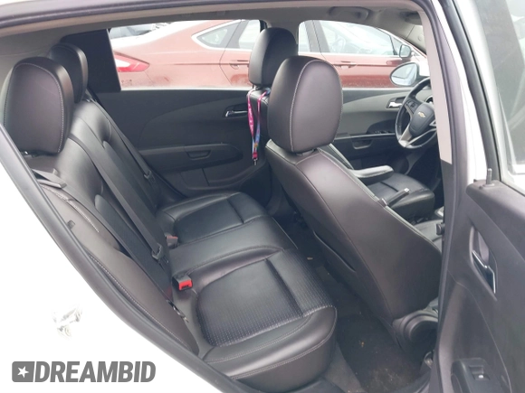 2016 Chevrolet Sonic LTZ z VIN 1G1JE6SB9G4146075, wystawiony jako IAAI lot #41750534 z przebiegiem 103 240 mil mil oraz . Historia ofert i sprzedaży dostępna na DreamBid. Obrazek 8.