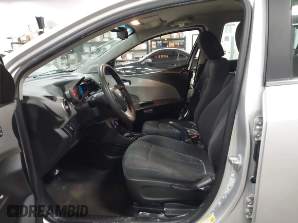 2014 Chevrolet Sonic LT with VIN 1G1JC5SG8E4107664, listed as a IAAI auction lot 41614306 with 128,946 mi miles and . Bid and sale history available at DreamBid. Image 5.