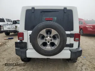 2016 Jeep Wrangler Unlimited 75th Anniversary with VIN 1C4BJWEG8GL143348, listed as a Copart auction lot 44254585 with 111,616 mi miles and Salvage Title. Bid and sale history available at carsss.com. Image 6.