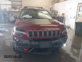 2021 Jeep Cherokee Trailhawk with VIN 1C4PJMBX4MD206997, listed as a IAAI auction lot 41565140 with Not provided miles and . Bid and sale history available at DreamBid. Image 6.