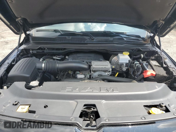 2023 Ram 1500 Laramie with VIN 1C6SRFRT1PN577199, listed as a Copart auction lot 64833895 with 22,119 mi miles and Salvage title. Bid and sale history available at DreamBid. Image 11.