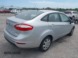 2017 Ford Fiesta S with VIN 3FADP4AJ0HM171227, listed as a IAAI auction lot 42380556 with 88,558 mi miles and . Bid and sale history available at DreamBid. Image 4.
