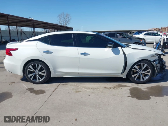 2016 Nissan Maxima SV z VIN 1N4AA6AP8GC436917, wystawiony jako IAAI lot #41691025 z przebiegiem 140 149 mil mil oraz . Historia ofert i sprzedaży dostępna na DreamBid. Obrazek 14.