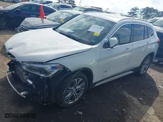 2017 BMW X1 xDrive28i with VIN WBXHT3Z30H4A64932, listed as a IAAI auction lot 41779359 with 72,612 mi miles. Bid and sale history available at carsss.com. Image 18.