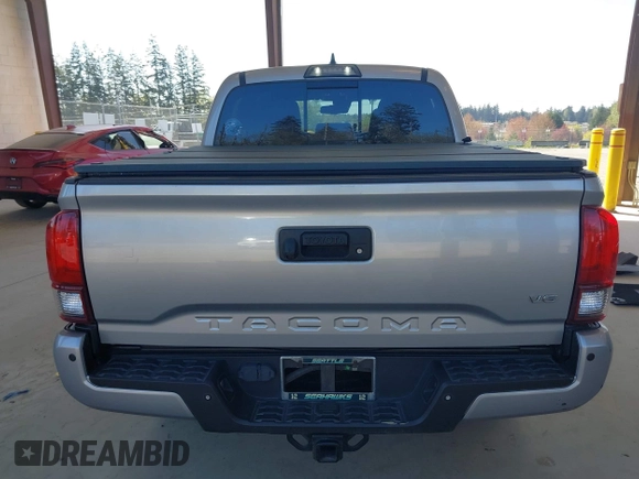 2018 Toyota Tacoma SR with VIN 3TMCZ5ANXJM146284, listed as a IAAI auction lot 42041525 with 103,143 mi miles and . Bid and sale history available at DreamBid. Image 17.