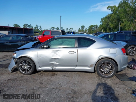 2012 Scion tC z VIN JTKJF5C77C3032559, wystawiony jako IAAI lot #41892954 z przebiegiem 207 718 mil mil oraz . Historia ofert i sprzedaży dostępna na DreamBid. Obrazek 14.