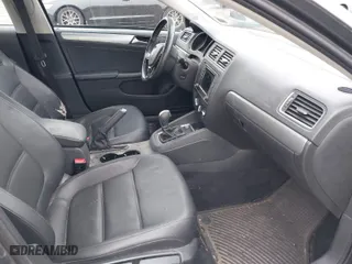 2016 Volkswagen Jetta Sedan 1.4T SE w/Connectivity with VIN 3VWD67AJ0GM255333, listed as a IAAI auction lot 41533835 with 53,277 mi miles. Bid and sale history available at carsss.com. Image 5.