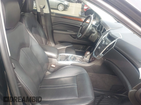 2012 Cadillac SRX Premium Collection with VIN 3GYFNFE34CS614896, listed as a IAAI auction lot 41987735 with 93,972 mi miles and . Bid and sale history available at DreamBid. Image 5.