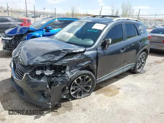 2016 Mazda CX-5 Grand Touring with VIN JM3KE4DY7G0643643, listed as a IAAI auction lot 42077497 with 120,343 mi miles and . Bid and sale history available at carsss.com. Image 2.