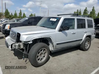 2007 Jeep Commander Sport z VIN 1J8HG48K97C505712, wystawiony jako Copart lot #72011114 z przebiegiem 146 981 mil mil oraz Szkoda całkowita • Salvage title. Historia ofert i sprzedaży dostępna na DreamBid. Obrazek 1.
