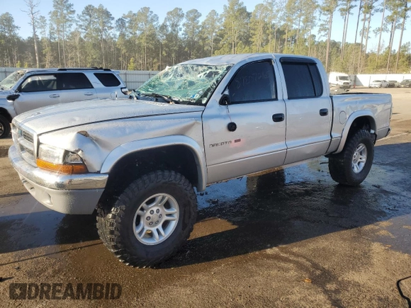 2002 Dodge Dakota SLT with VIN 1B7HG48N42S588224, listed as a Copart auction lot 87807265 with 69,817 mi miles and Salvage Title. Bid and sale history available at carsss.com. Image 1.