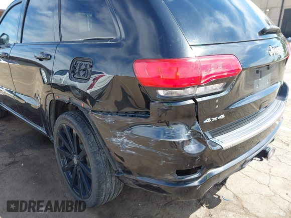 2014 Jeep Grand Cherokee Overland with VIN 1C4RJFCT8EC106005, listed as a IAAI auction lot 41989721 with 148,469 mi miles and . Bid and sale history available at DreamBid. Image 6.