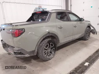 2023 Hyundai Santa Cruz SEL Premium z VIN 5NTJDDAF5PH052824, wystawiony jako IAAI lot #41599885 z przebiegiem 33 281 mil mil oraz . Historia ofert i sprzedaży dostępna na DreamBid. Obrazek 4.