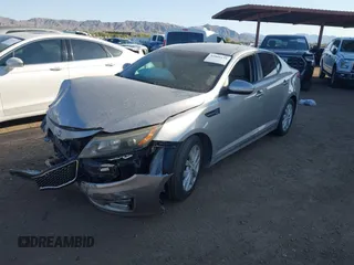 2015 Kia Optima LX with VIN 5XXGM4A78FG473769, listed as a IAAI auction lot 42008139 with 124,641 mi miles and . Bid and sale history available at DreamBid. Image 2.