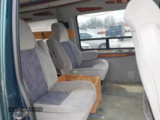 1999 Ford Econoline Cargo with VIN 1FDRE14W4XHC30466, listed as a IAAI auction lot 41935293 with 276,092 mi miles. Bid and sale history available at carsss.com. Image 8.