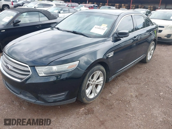 2014 Ford Taurus SEL with VIN 1FAHP2E83EG125068, listed as a IAAI auction lot 42101295 with 244,063 mi miles. Bid and sale history available at carsss.com. Image 2.