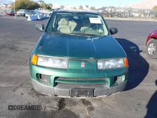 2003 Saturn VUE with VIN 5GZCZ33D63S902677, listed as a IAAI auction lot 41391887 with 153,621 mi miles. Bid and sale history available at carsss.com. Image 12.