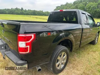 2018 Ford F-150 XL z VIN 1FTFX1E5XJFA79594, wystawiony jako Copart lot #65503505 z przebiegiem 158 280 mil mil oraz Czysty tytuł • Clean title. Historia ofert i sprzedaży dostępna na DreamBid. Obrazek 4.