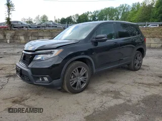 2021 Honda Passport EX-L z VIN 5FNYF8H55MB011163, wystawiony jako Copart lot #59029635 z przebiegiem 74 444 mil mil oraz Szkoda całkowita • Salvage title. Historia ofert i sprzedaży dostępna na DreamBid. Obrazek 1.