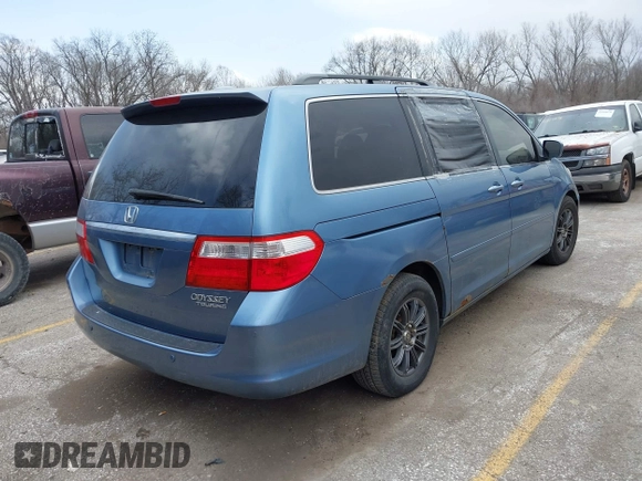 2005 Honda Odyssey TOURING with VIN 5FNRL38815B048075, listed as a IAAI auction lot 41813377 with 259,138 mi miles. Bid and sale history available at carsss.com. Image 4.