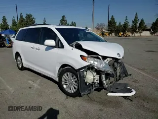 2013 Toyota Sienna XLE AAS with VIN 5TDYK3DC5DS322039, listed as a Copart auction lot 61657715 with 185,269 mi miles and Salvage title. Bid and sale history available at DreamBid. Image 15.