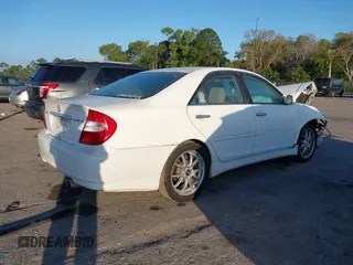 2003 Toyota Camry LE with VIN 4T1BE32KX3U196211, listed as a IAAI auction lot 41535512 with 184,473 mi miles and . Bid and sale history available at DreamBid. Image 4.