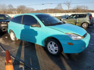 2000 Ford Focus ZX3 with VIN 3FAHP3131YR213601, listed as a Copart auction lot 88597525 with 134,724 mi miles and Salvage title. Bid and sale history available at DreamBid. Image 4.