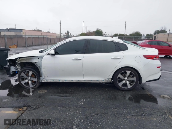2020 Kia Optima LX with VIN 5XXGT4L32LG426259, listed as a IAAI auction lot 41569308 with 114,656 mi miles. Bid and sale history available at carsss.com. Image 14.