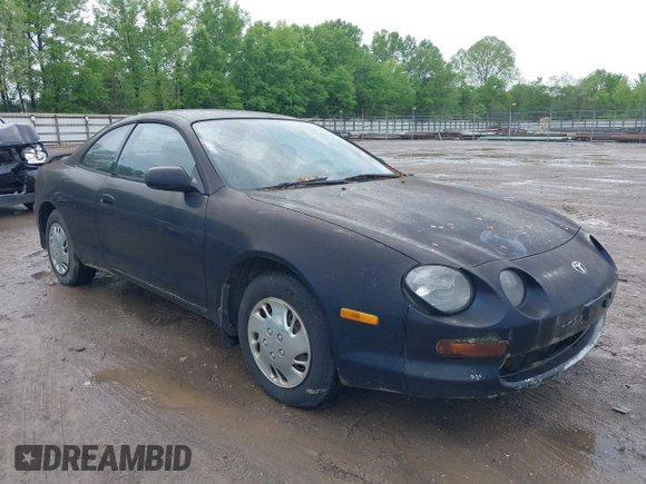 1995 Toyota Celica ST with VIN JT2AT00F7S0040443, listed as a IAAI auction lot 42125327 with 286,767 mi miles. Bid and sale history available at carsss.com. Image 1.