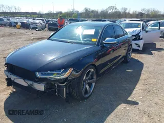 2013 Audi S6 Prestige with VIN WAUJ2AFC0DN096028, listed as a IAAI auction lot 41817347 with 132,992 mi miles. Bid and sale history available at carsss.com. Image 2.
