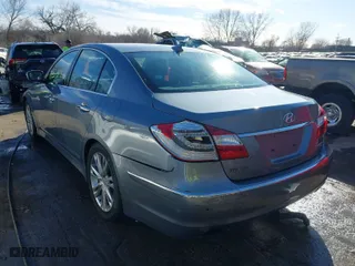 2014 Hyundai Genesis 3.8L with VIN KMHGC4DD2EU265539, listed as a IAAI auction lot 41634825 with 61,619 mi miles. Bid and sale history available at carsss.com. Image 3.