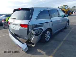 2017 Honda Odyssey EX-L with VIN 5FNRL5H64HB017661, listed as a IAAI auction lot 41719447 with 99,895 mi miles and . Bid and sale history available at DreamBid. Image 4.