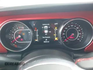 2021 Jeep Gladiator Rubicon with VIN 1C6JJTBGXML572976, listed as a IAAI auction lot 42134909 with 35,612 mi miles and . Bid and sale history available at DreamBid. Image 7.