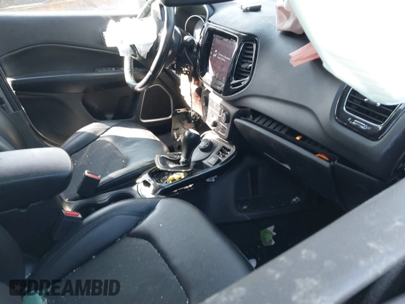 2019 Jeep Compass Latitude with VIN 3C4NJDBB1KT648185, listed as a IAAI auction lot 41622077 with 74,072 mi miles and . Bid and sale history available at DreamBid. Image 5.