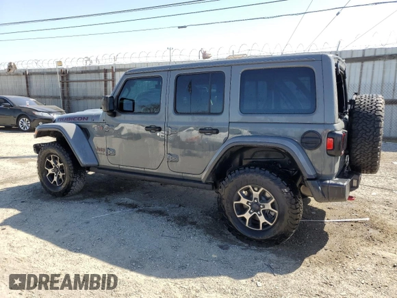 2019 Jeep Wrangler Unlimited Rubicon with VIN 1C4HJXFN1KW502477, listed as a Copart auction lot 52441455 with 53,110 mi miles and Salvage title. Bid and sale history available at DreamBid. Image 2.
