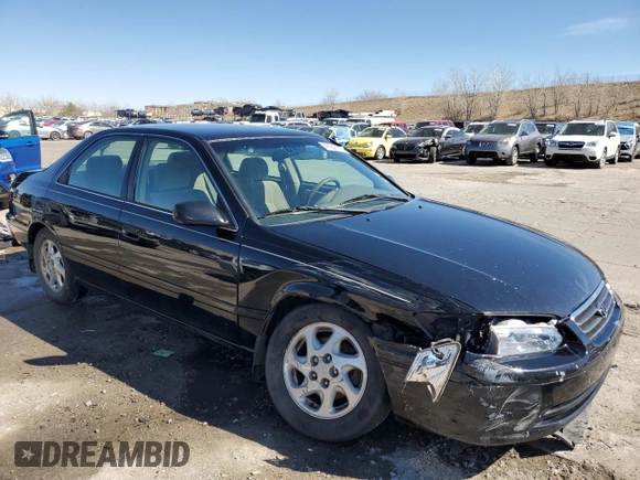 2000 Toyota Camry CE z VIN 4T1BG22K0YU699662, wystawiony jako Copart lot #47949165 z przebiegiem 270 179 mil mil oraz Szkoda całkowita • Salvage title. Historia ofert i sprzedaży dostępna na DreamBid. Obrazek 4.