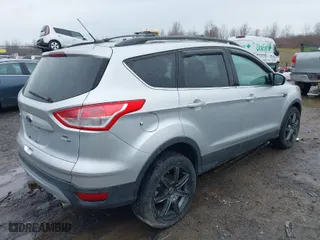 2013 Ford Escape SE with VIN 1FMCU9G9XDUD14646, listed as a IAAI auction lot 41968132 with 85,532 mi miles. Bid and sale history available at carsss.com. Image 4.