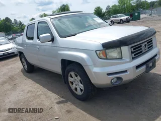 2006 Honda Ridgeline RTL with VIN 2HJYK16566H550339, listed as a IAAI auction lot 42223323 with 240,372 mi miles and . Bid and sale history available at DreamBid. Image 1.