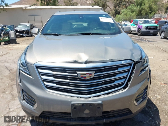 2018 Cadillac XT5 FWD with VIN 1GYKNARS5JZ242794, listed as a IAAI auction lot 42813475 with 32,266 mi miles and . Bid and sale history available at DreamBid. Image 11.