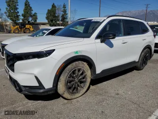 2023 Honda CR-V Hybrid Sport with VIN 2HKRS5H52PH705264, listed as a Copart auction lot 50102705 with 33,558 mi miles and Salvage Title. Bid and sale history available at carsss.com. Image 1.