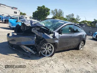 2023 Tesla Model Y Long Range z VIN 7SAYGDEE7PA191681, wystawiony jako Copart lot #50735155 z przebiegiem 12 836 mil mil oraz Szkody całkowita. Historia ofert i sprzedaży dostępna na DreamBid. Obrazek 1.