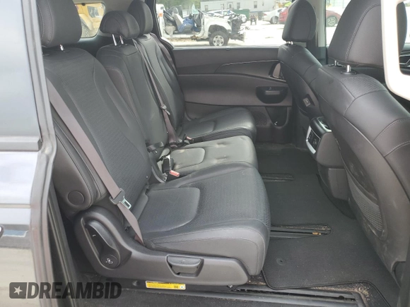 2025 Kia Carnival SX with VIN KNDNE5K37S6490478, listed as a Copart auction lot 51389565 with 6,929 mi miles and Salvage Title. Bid and sale history available at DreamBid. Image 11.