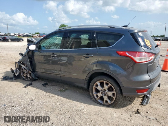 2016 Ford Escape Titanium с VIN 1FMCU9J97GUB28172, выставлен на аукционе Copart как лот 59658095 с пробегом Не указан миль и Списание • Salvage title. История ставок и продаж доступна на DreamBid. Изображение 2.