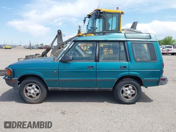 1994 Land Rover Discovery SD z VIN SALJY1247RA097510, wystawiony jako IAAI lot #42343474 z przebiegiem 137 141 mil mil oraz . Historia ofert i sprzedaży dostępna na DreamBid. Obrazek 14.