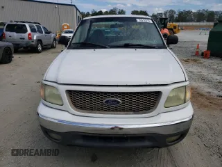 2000 Ford F-150 XL с VIN 1FTRF17W7YNB26280, выставлен на аукционе Copart как лот 70512574 с пробегом Не указан миль и Списание • Salvage title. История ставок и продаж доступна на DreamBid. Изображение 5.